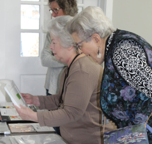 Artists browsing discounted art supply sale